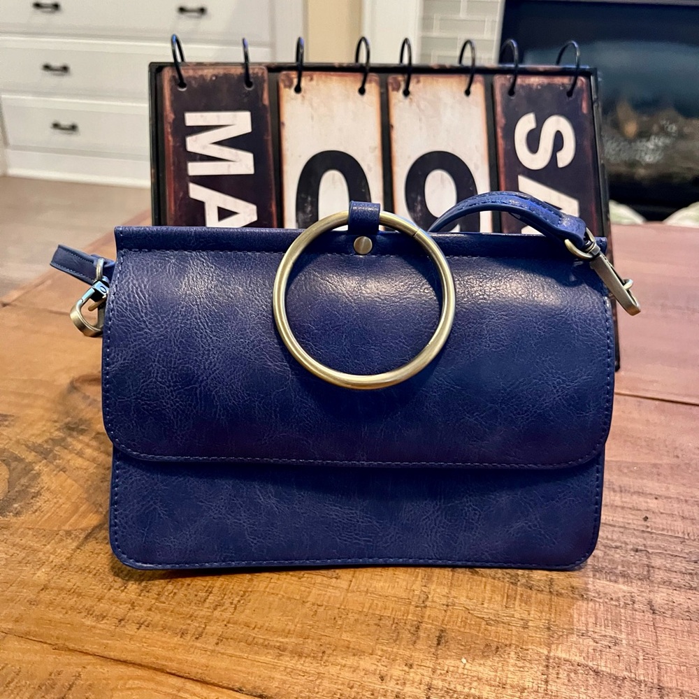 NWOT Blue crossbody Handbag with brass accents